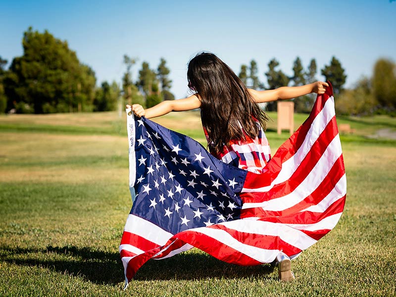 Campaign Principle Girl Running with USA Flag